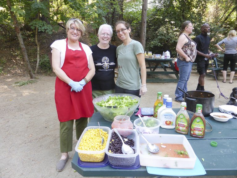 Sierra Roots volunteers at a community lunch in Pioneer Park.